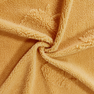 Warp ถักผ้าขนแกะเชอร์ปา 100% โพลีเอสเตอร์ Jacquard สีเหลืองสำหรับเสื้อผ้า